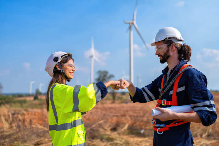 Skilled wind energy workers at a wind farm